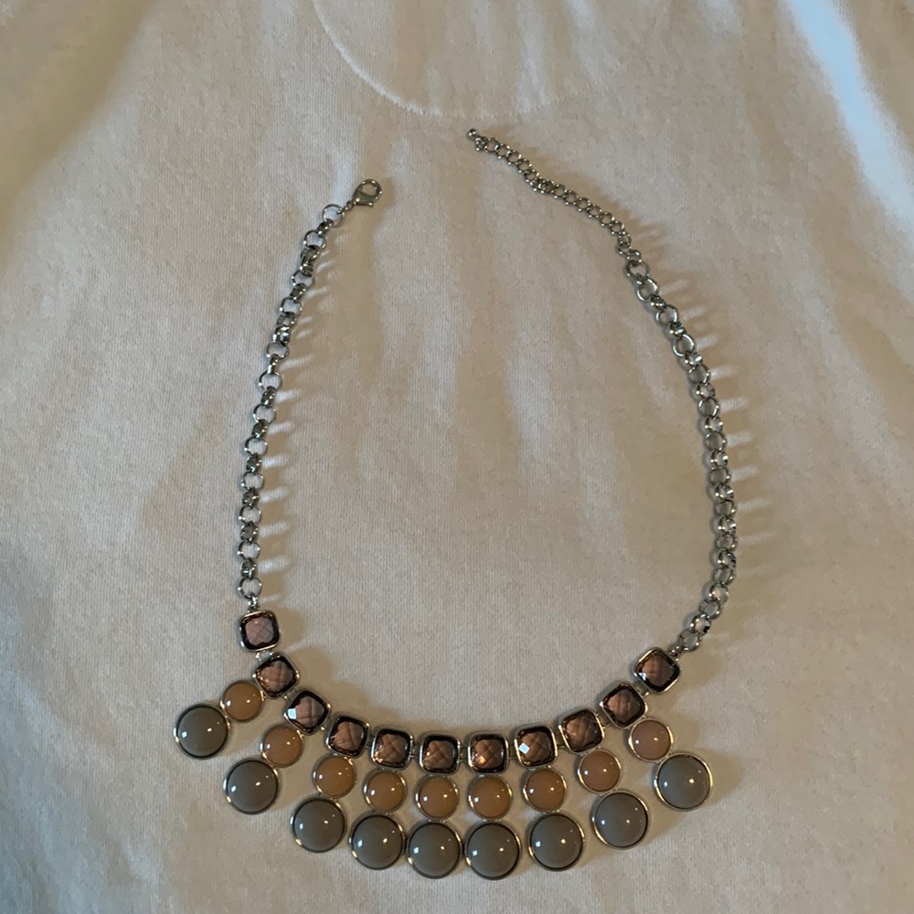 Two length necklace, silver chain with three other colored beads.